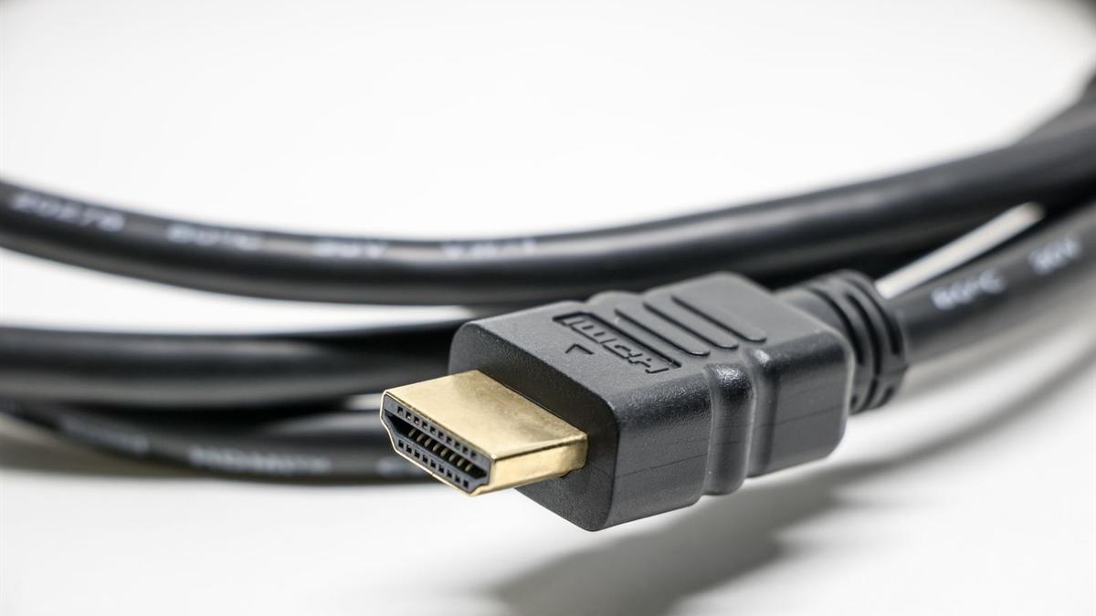 Close-up of a black HDMI cable with a gold connector